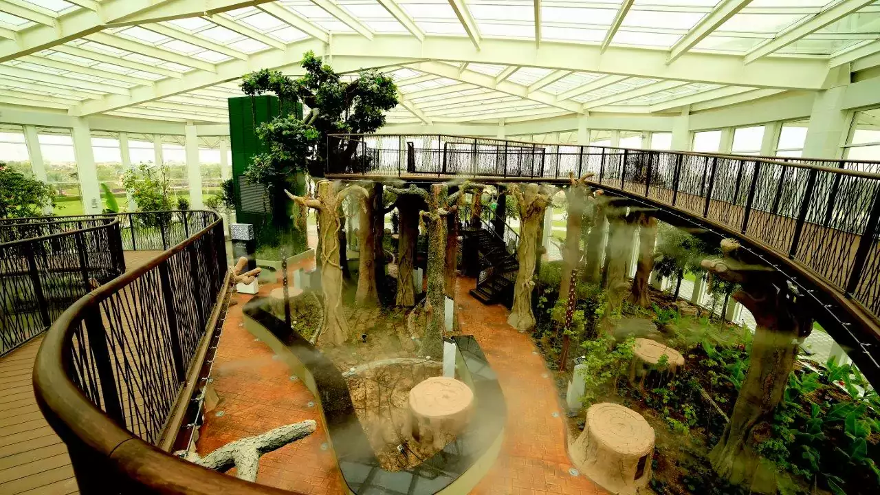 Dubai Quranic Park Greenhouse with lush greenery.