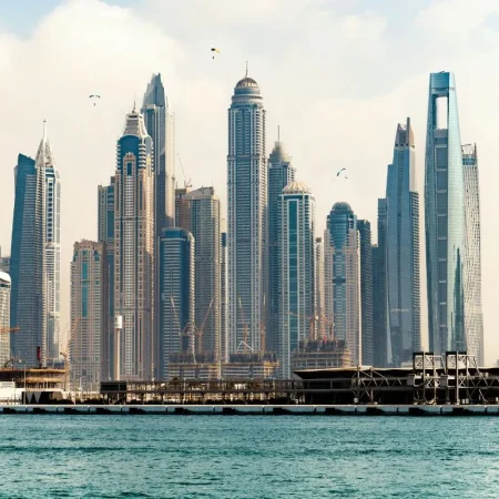 Dubai skyline above the waterfront during peak summer heat