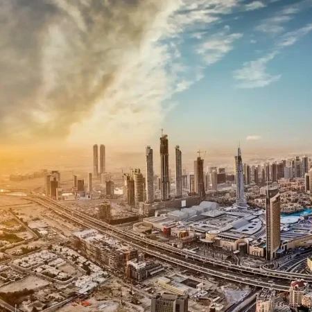 Dubai skyline at sunset with Burj Khalifa and Downtown Dubai